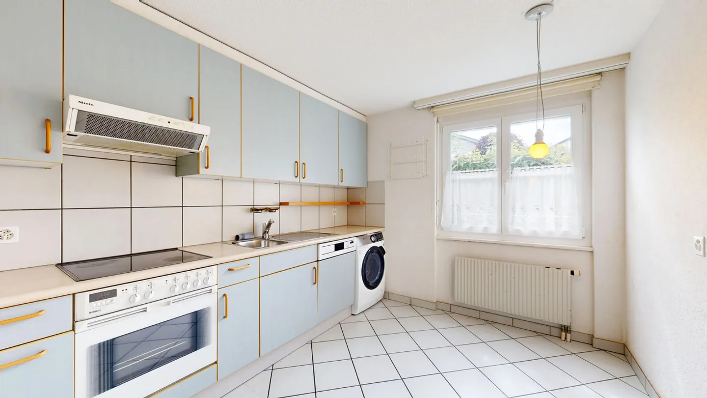 Appartement de jardin 4,5 pièces avec place de parking dans le Jura - Photo 6 sur 11