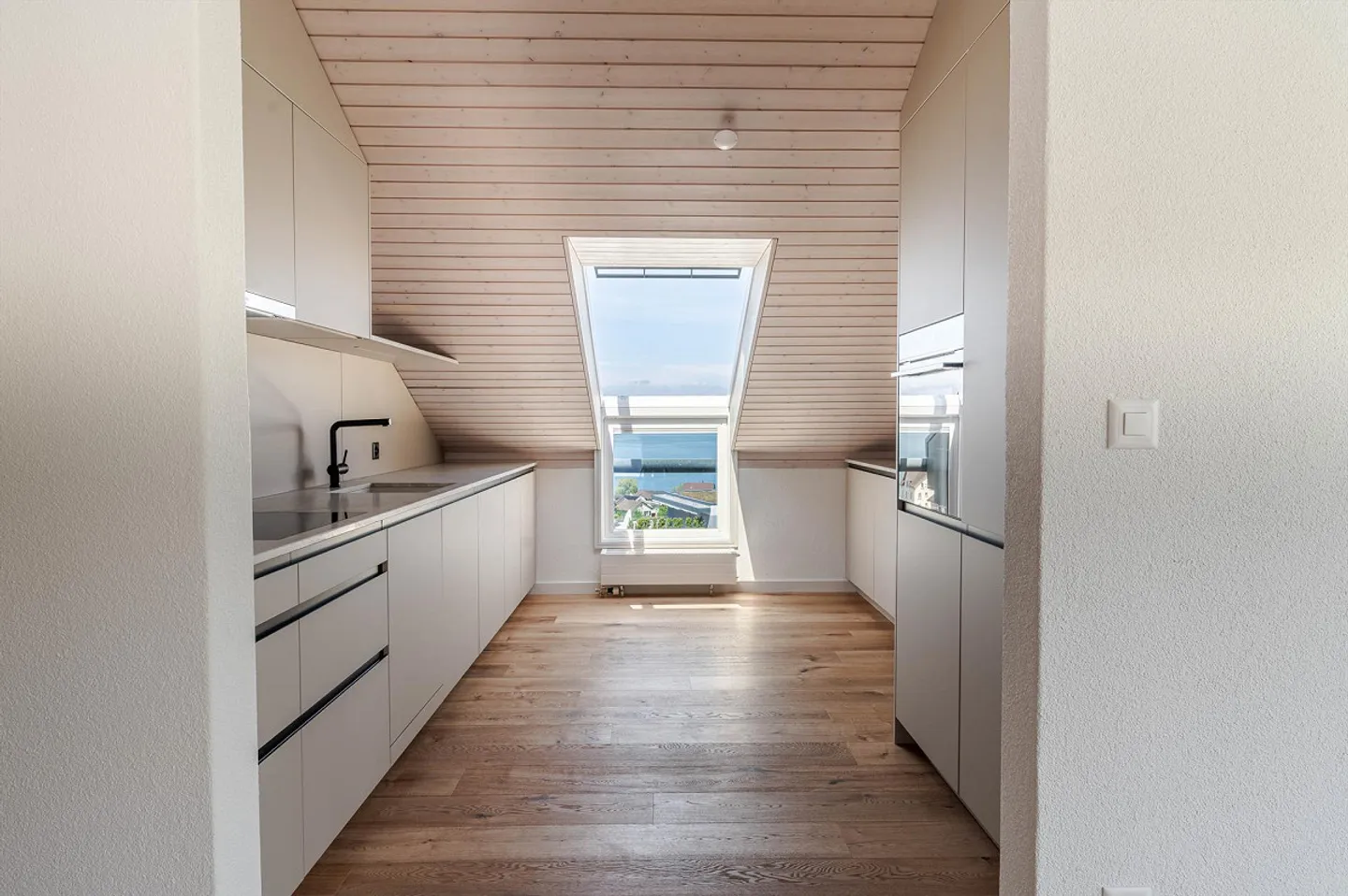 Bright Attic Apartment with Lake View - Photo 8 of 13