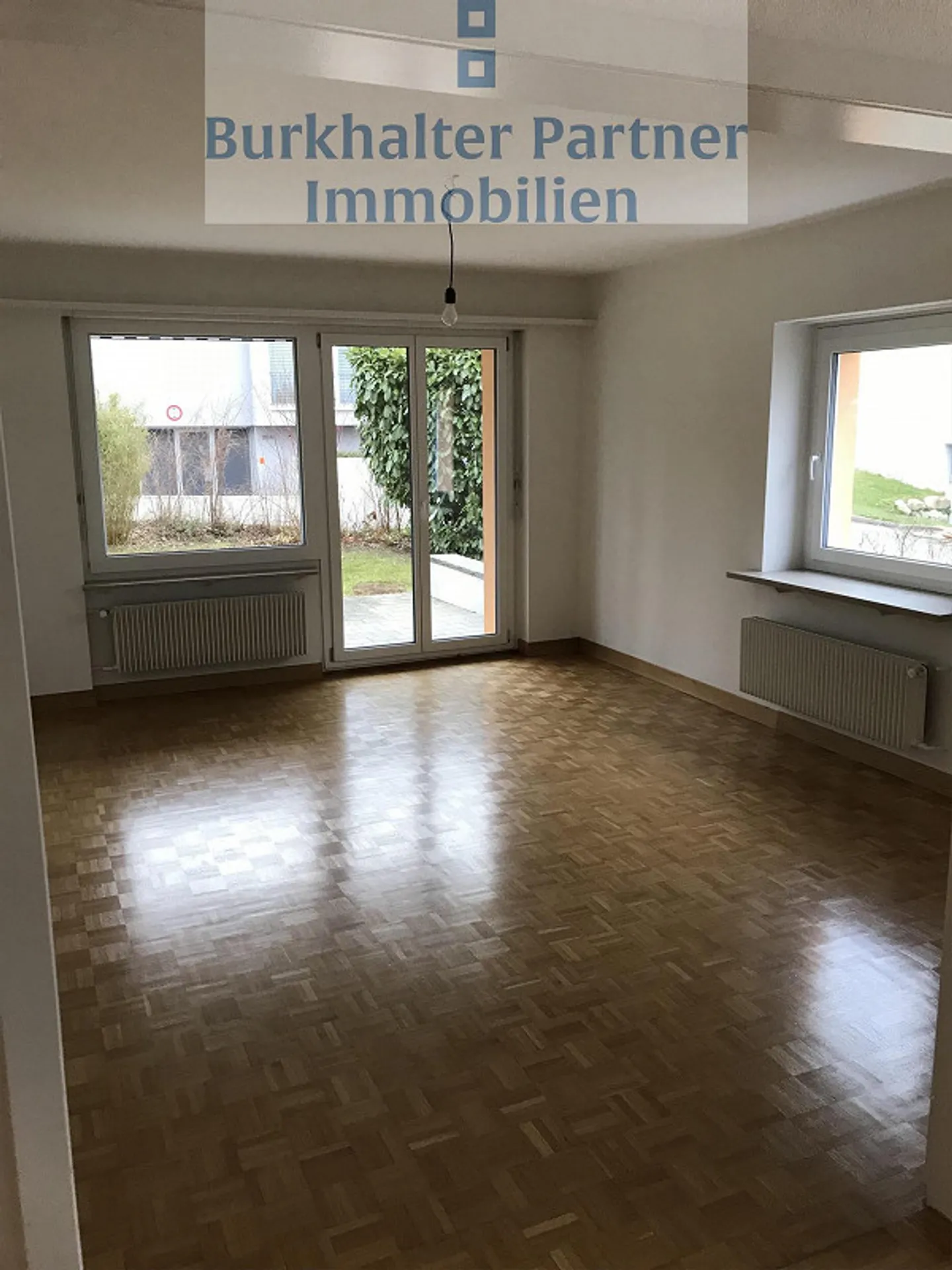 Helle Familienwohnung mit Garten - Foto 10 von 11
