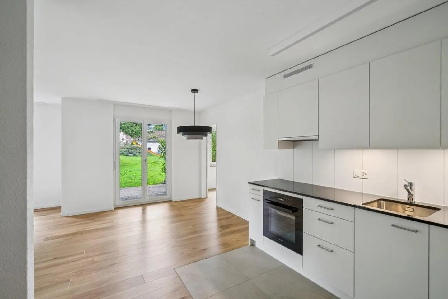 Moderne Wohnung mit Garten - Foto 3 von 7