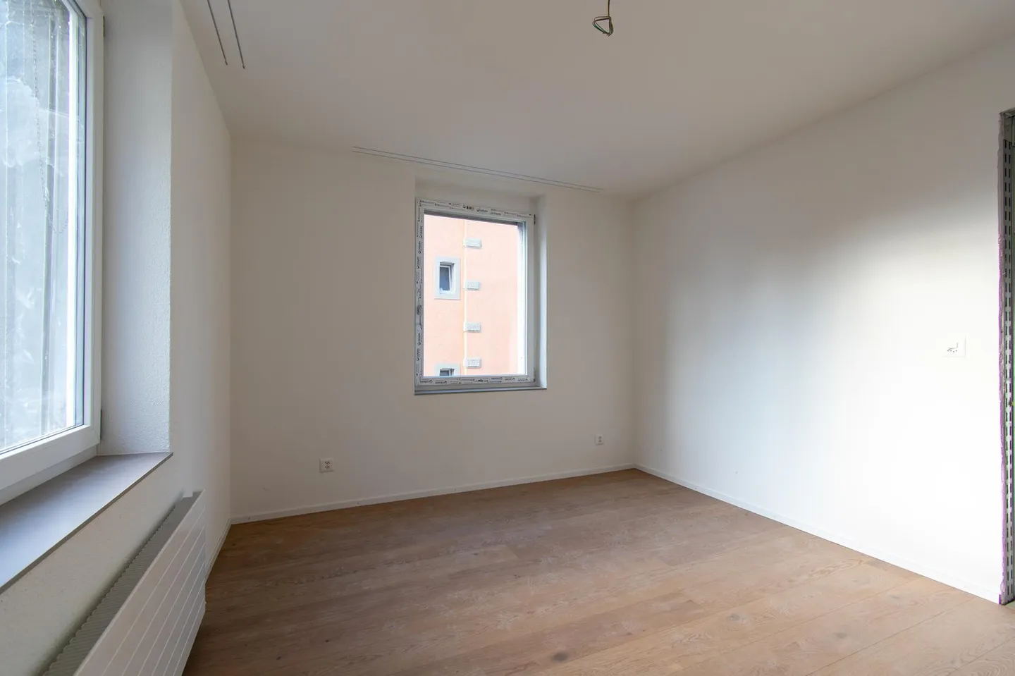 Ampio appartamento ristrutturato di 2,5 stanze con balcone - Foto 11 di 12