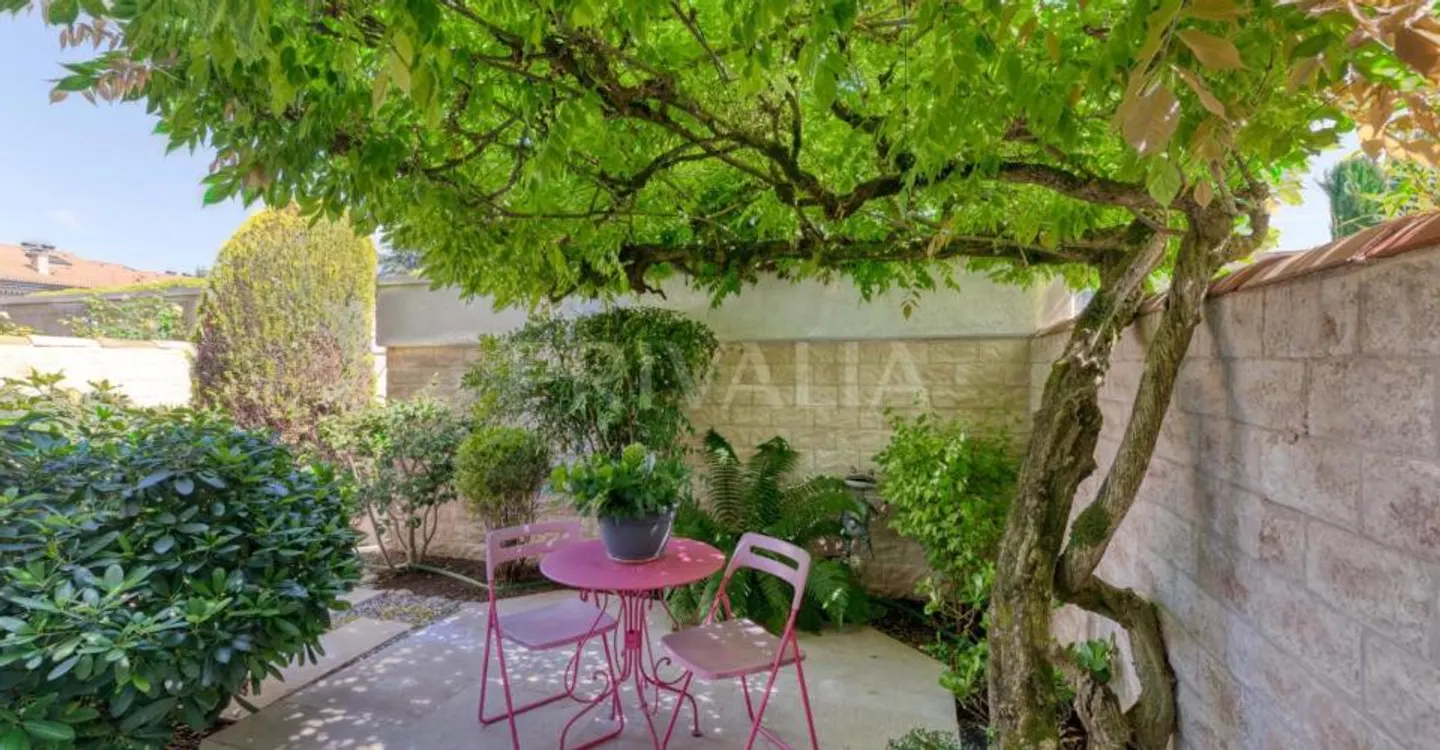 Charmante maison mitoyenne - Photo 7 sur 8