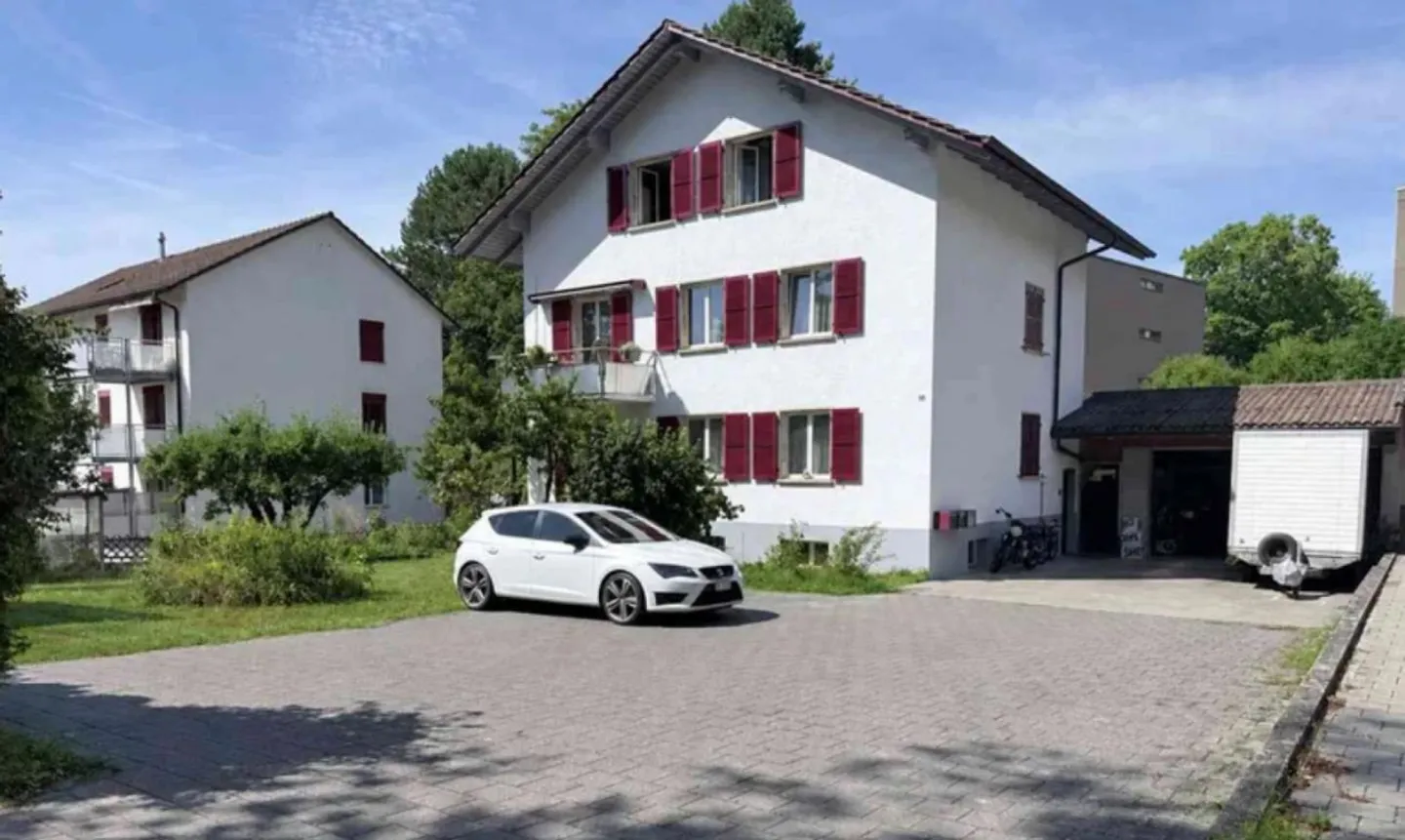 Three-family house with large garage/workshop - Photo 1 of 14