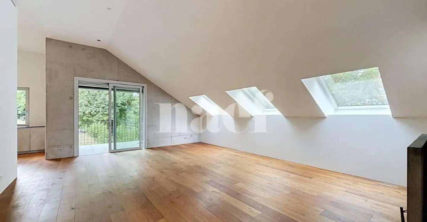 Appartement Contemporain avec Vue sur le Lac - Photo 2 sur 11