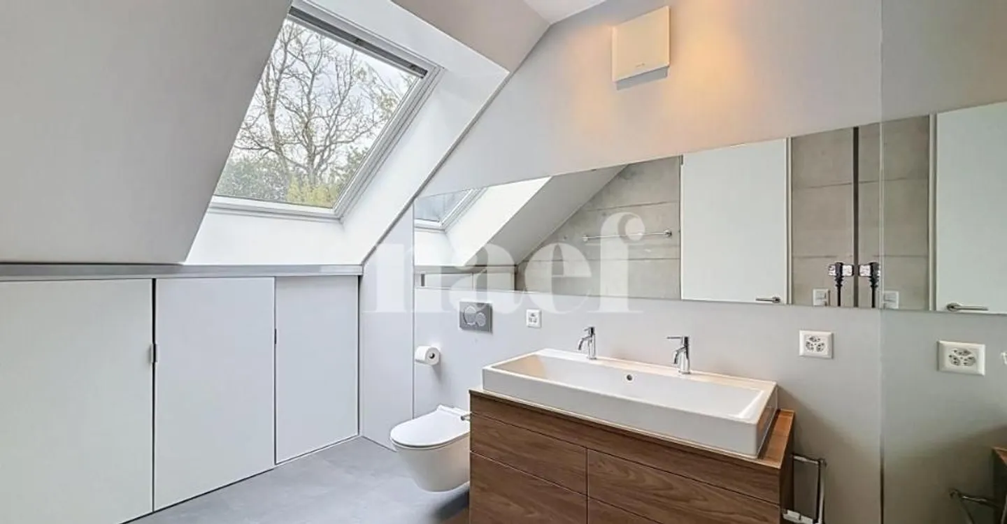 Appartement Contemporain avec Vue sur le Lac - Photo 7 sur 11