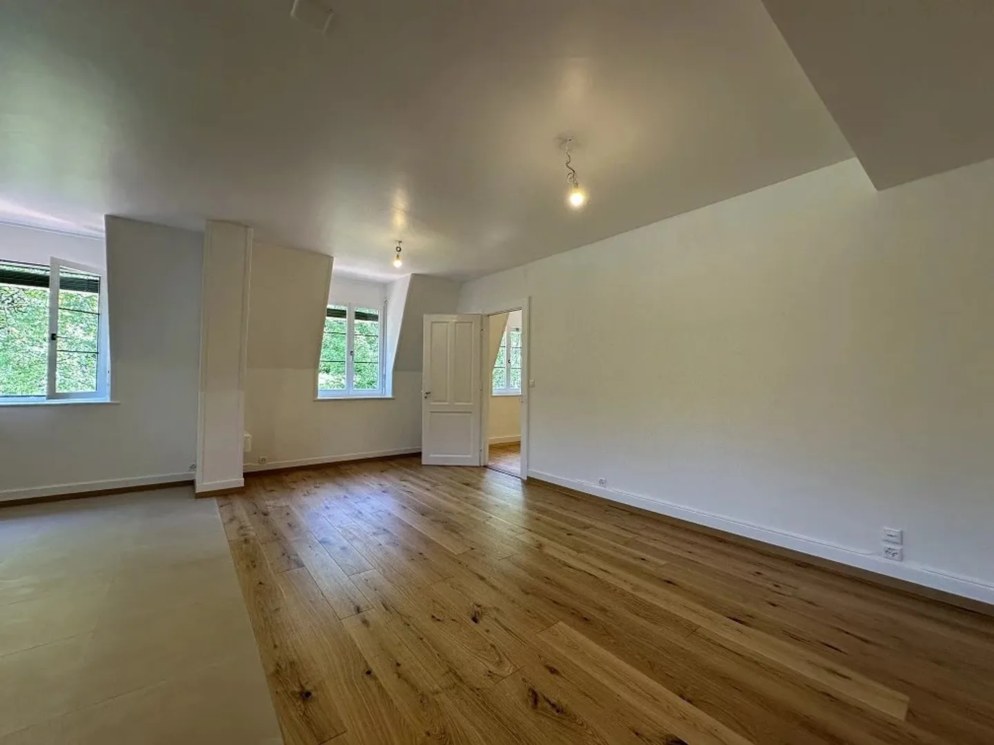 Appartement trois pièces sous le toit - Photo 2 sur 8