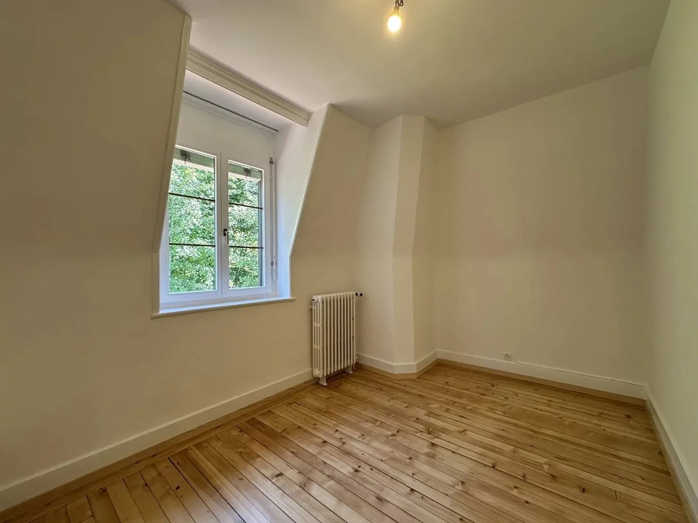 Appartement trois pièces sous le toit - Photo 4 sur 8