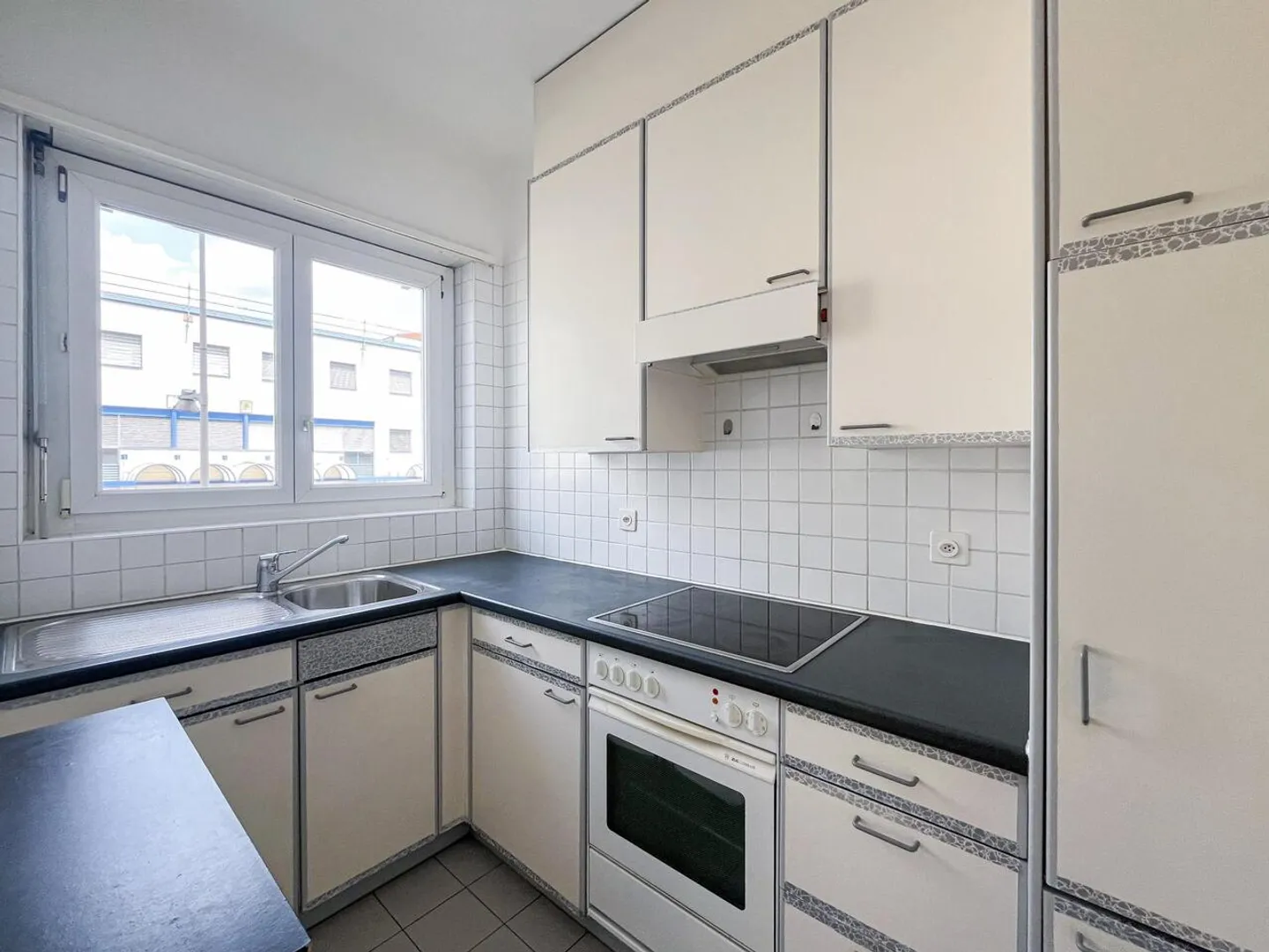 APPARTAMENTO DI 3.5 LOCALI IN ZONA CENTRALE A CHIASSO - Foto 5 di 7
