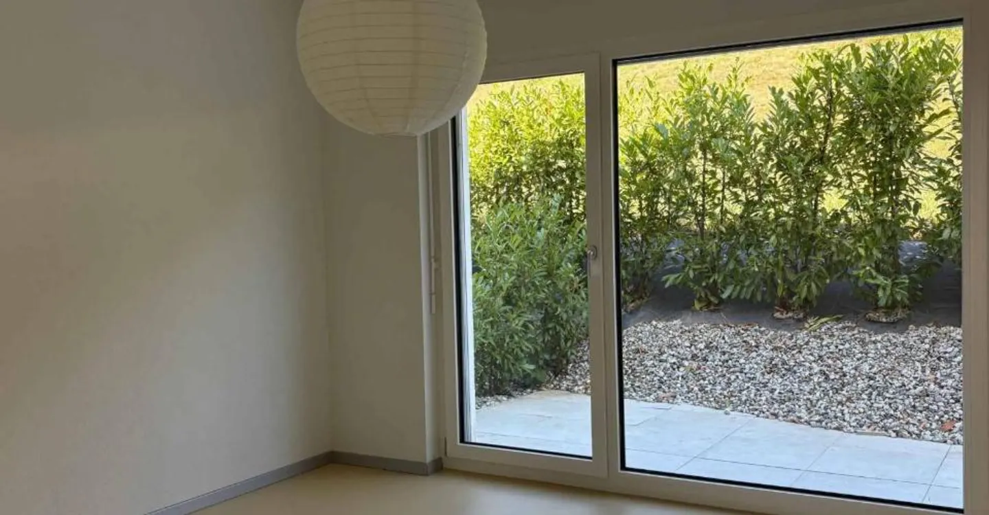 Appartement moderne avec jardin - Photo 5 sur 11