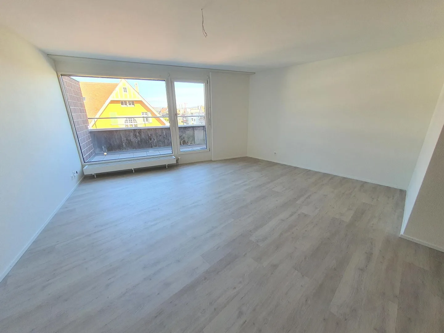 Charmante Attikawohnung in St. Johann - Foto 1 von 4