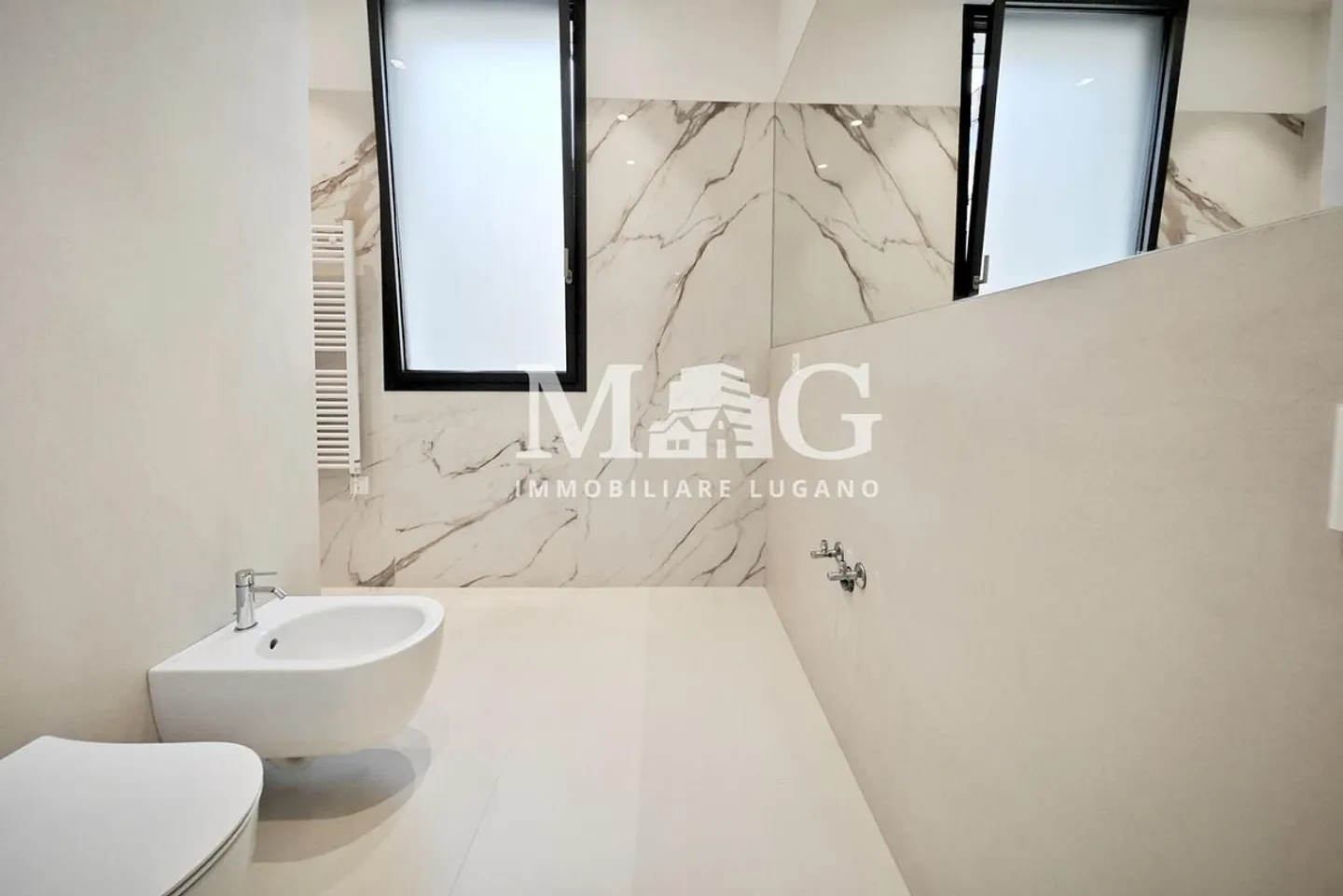 Lugano Centre : Appartement 4.5 pièces rénové près du lac - Photo 10 sur 11