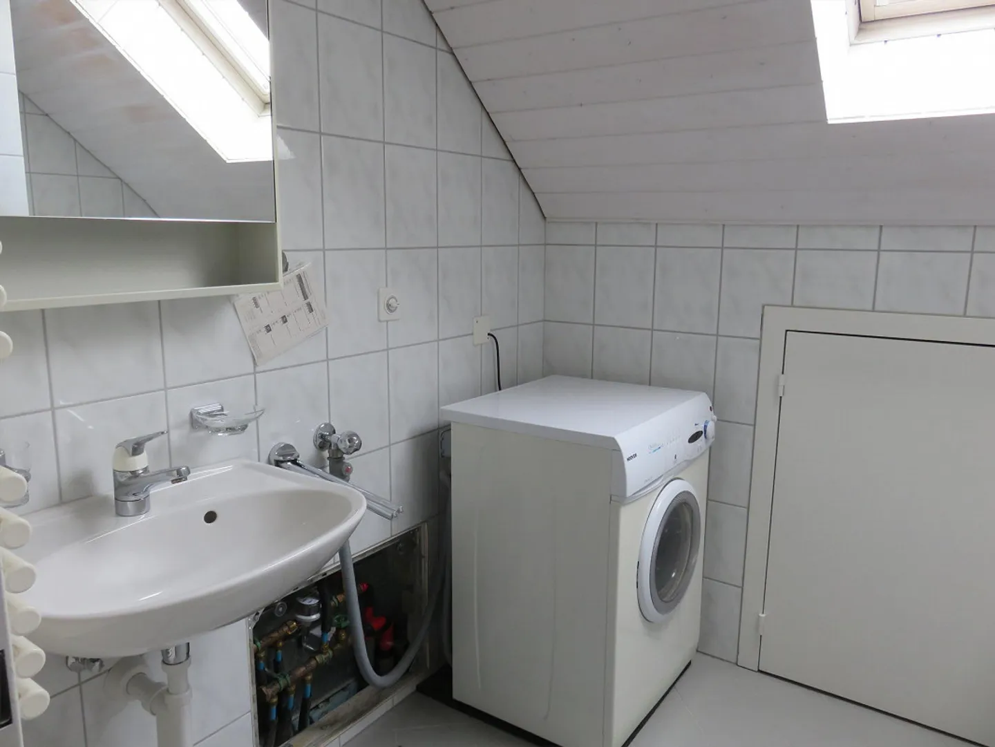 À louer appartement sous les combles de 2,5 pièces situé au centre - Photo 4 sur 6