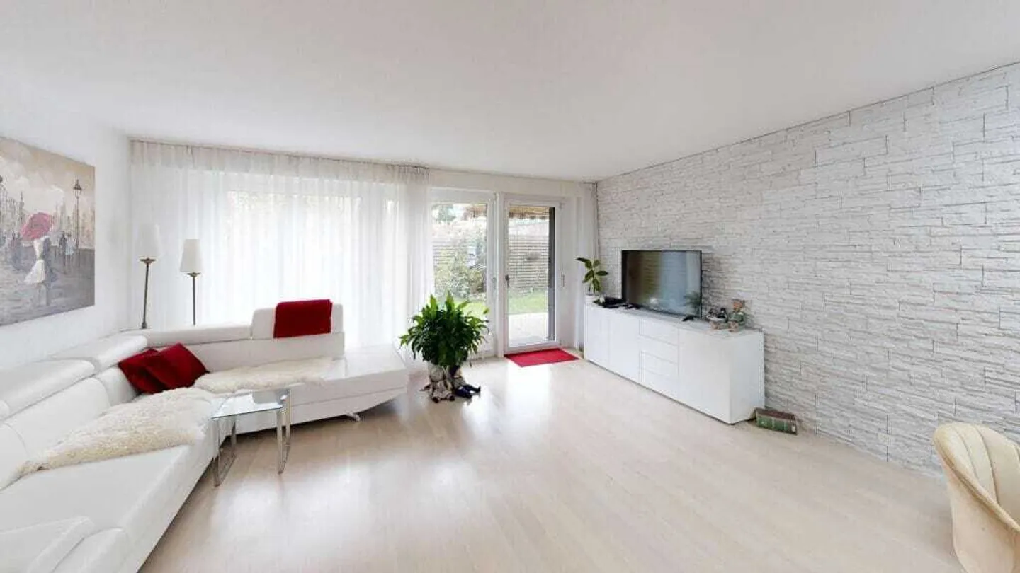 Appartement de jardin 3,5 pièces avec lumière et calme à Niederscherli - Photo 1 sur 13