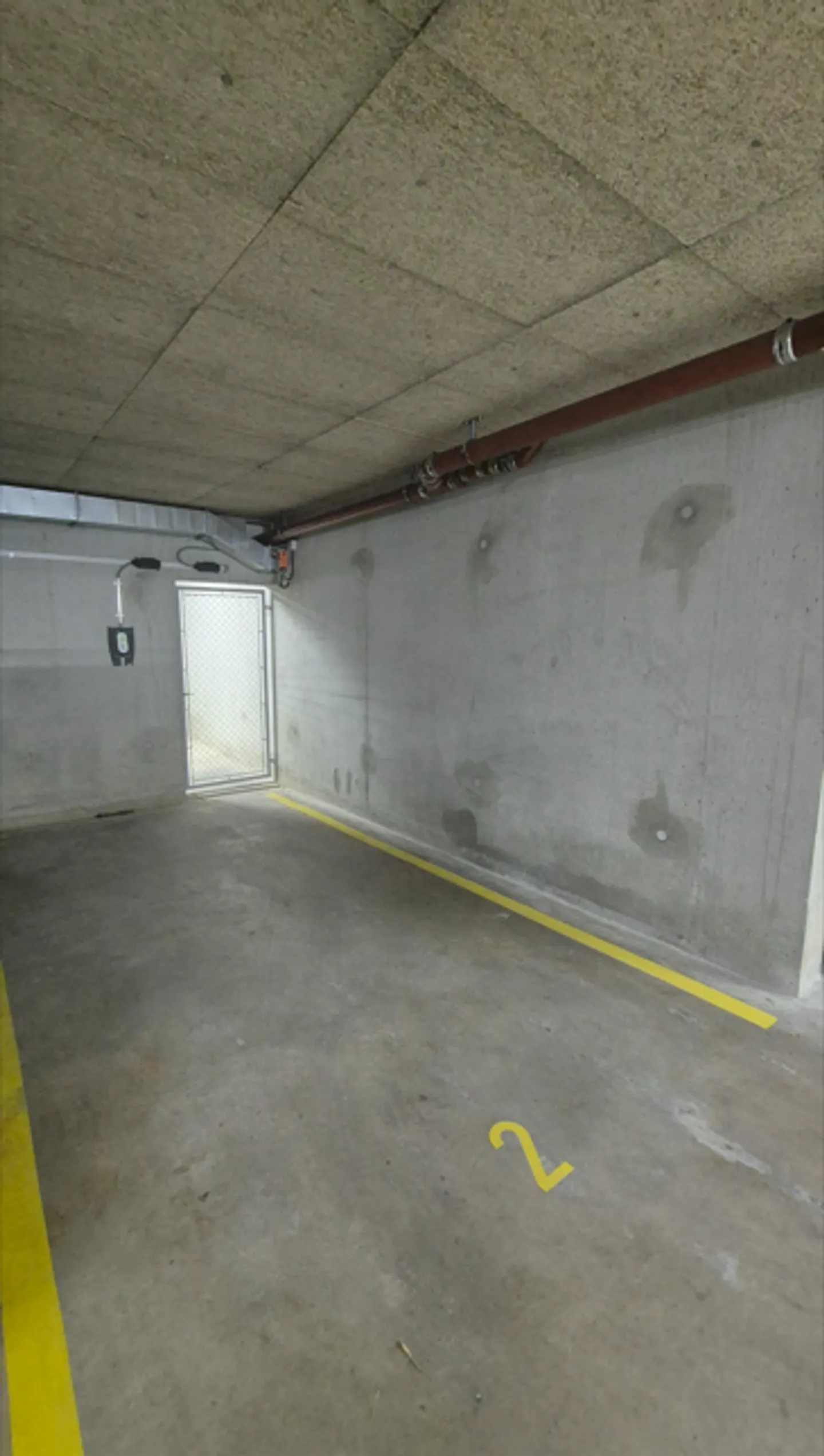 Innenparkplatz in Eysins - Foto 2 von 3
