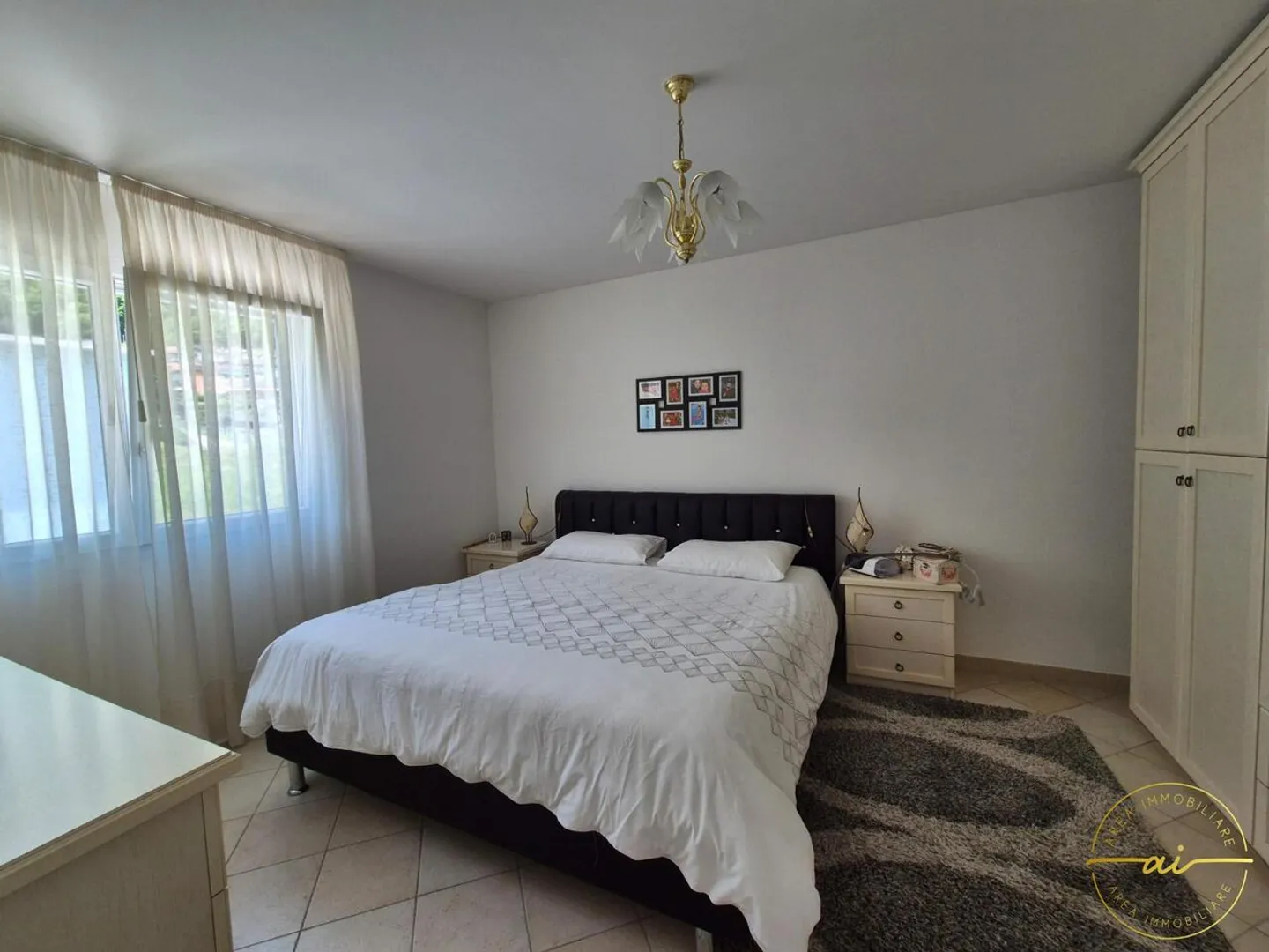 Bella casa unifamiliare con grande giardino a Mezzovico - Foto 11 di 13