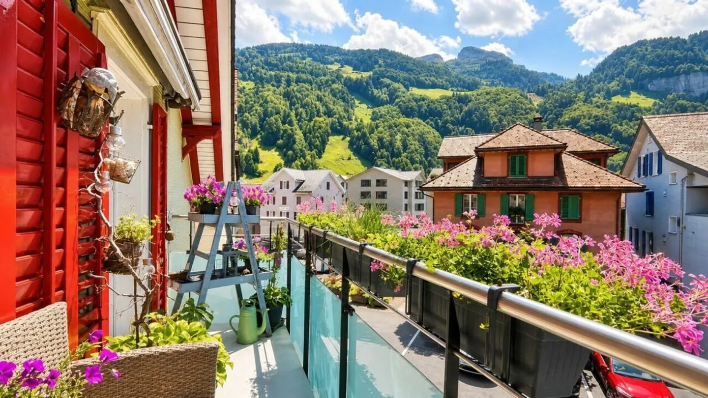 Grosszügige Dachwohnung mit Bergblick - Foto 1 von 20