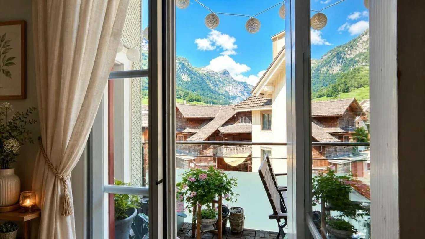 Grosszügige Dachwohnung mit Bergblick - Foto 3 von 20