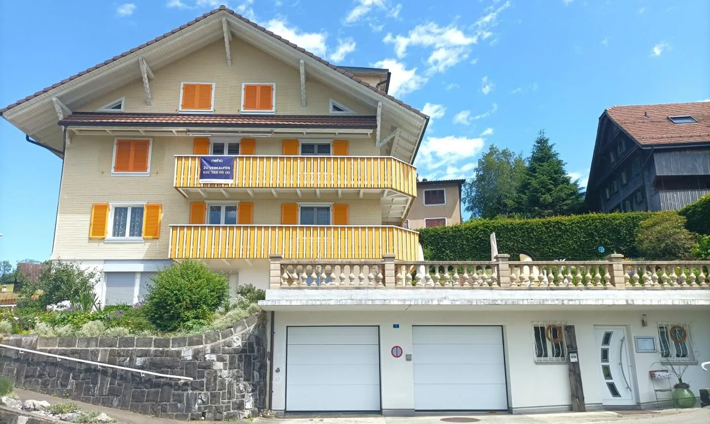 Vielseitiges Mehrfamilienhaus - Foto 1 von 13