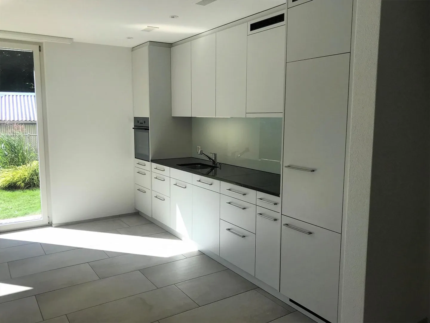 Modernes Erdgeschoss-Apartment - Foto 2 von 7