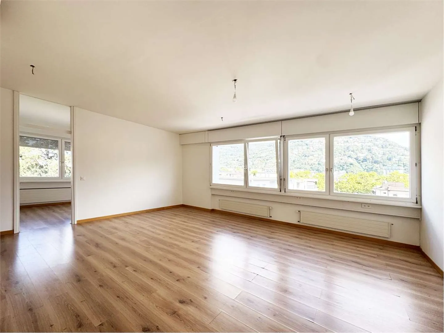 Appartamento 3.5 locali nel centro di Lugano con vista parziale sul lago - Foto 2 di 5