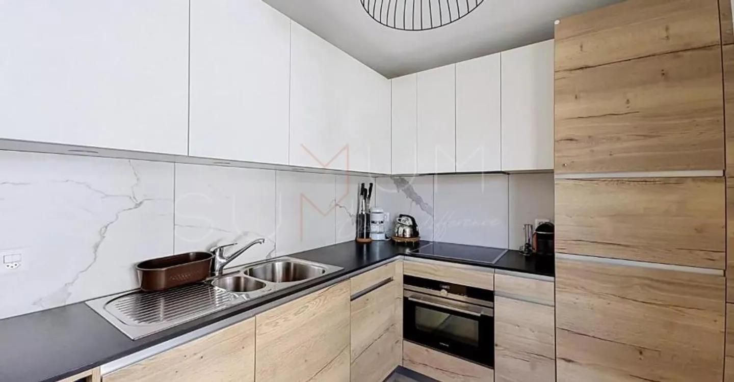 Appartement rénové avec jardin - Photo 6 sur 12