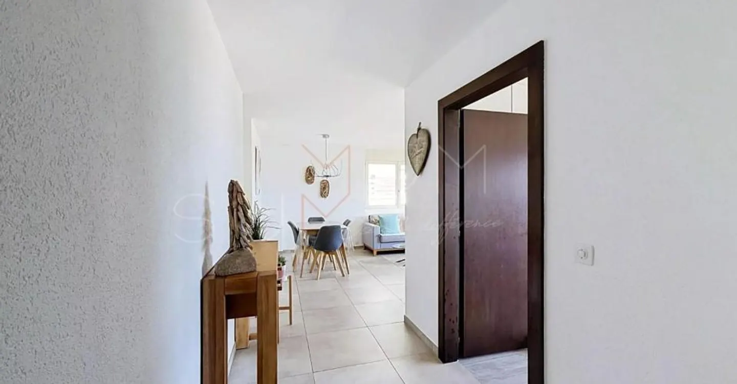 Appartement rénové avec jardin - Photo 7 sur 12