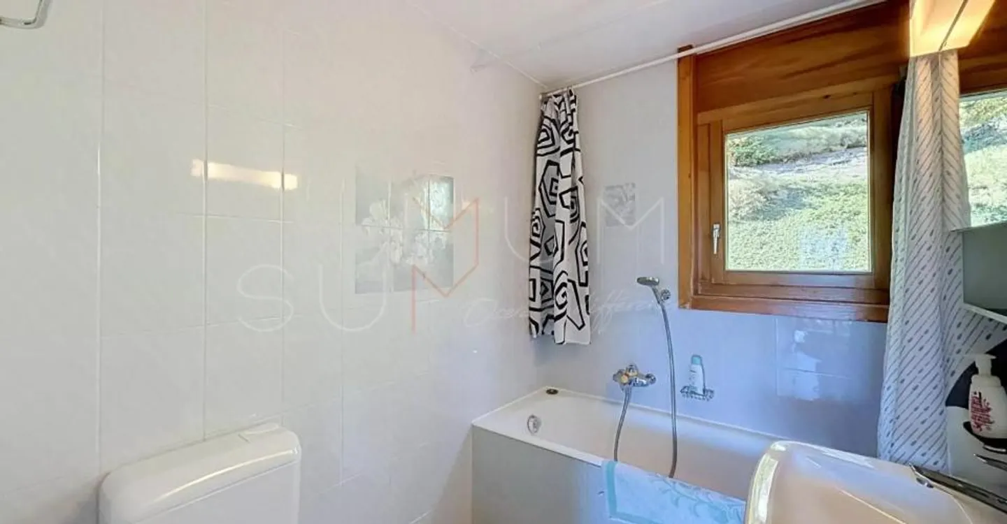 Appartement rénové avec jardin - Photo 9 sur 12