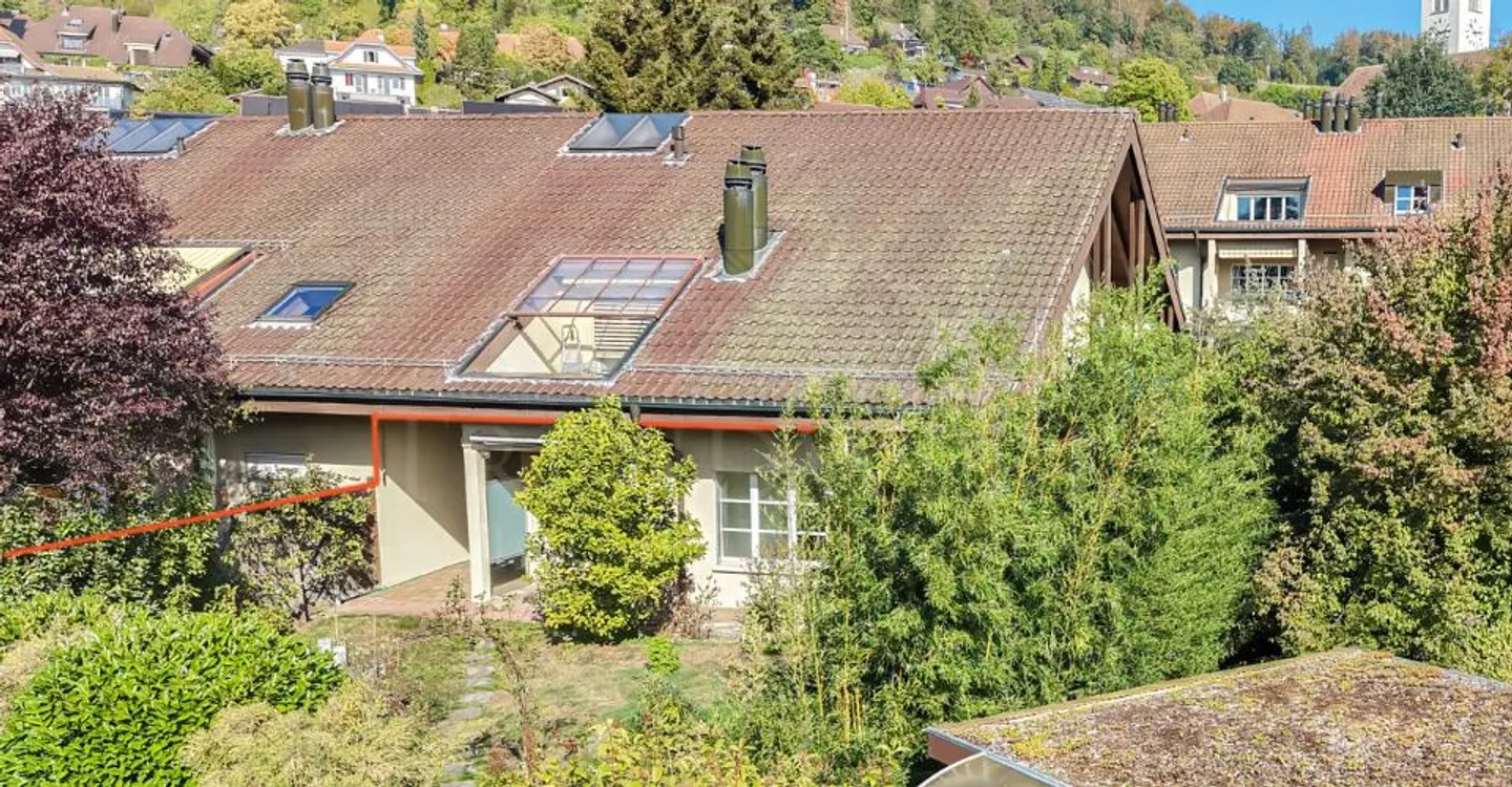 Appartement de 3 pièces avec jardin, situé au cœur de Gümligen - Photo 1 sur 13