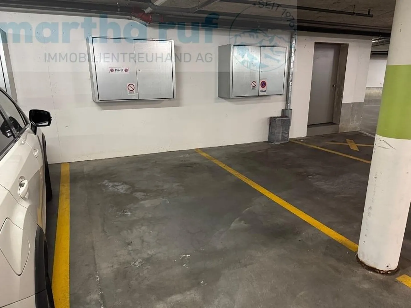 Fixer parking space in underground garage in Interlaken parking garage - Photo 2 of 4