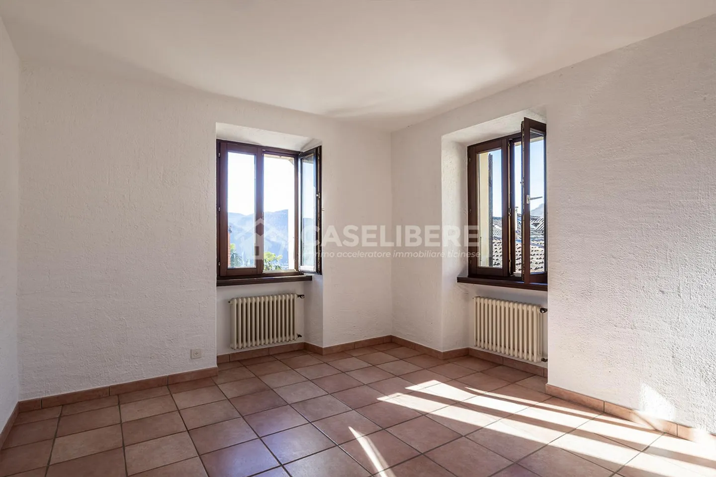 Kernhaus mit Seeblick in Neggio - Foto 12 von 23