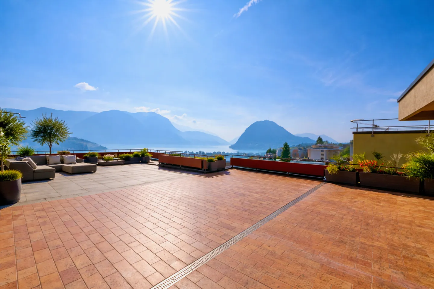 Exclusive Penthouse with 180° Panoramic Terrace over Lake and Mountains - Photo 1 of 26