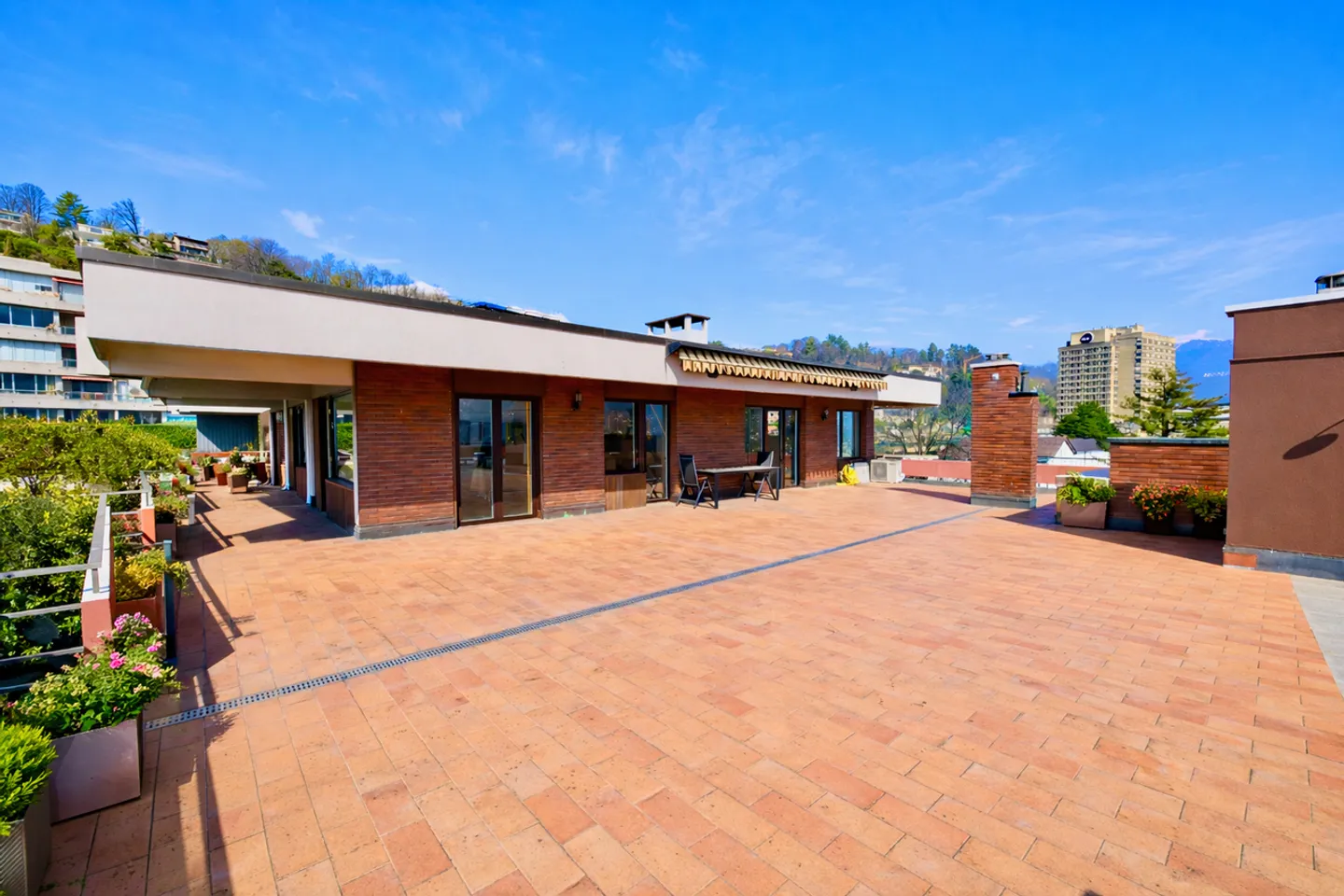 Exclusive Penthouse with 180° Panoramic Terrace over Lake and Mountains - Photo 2 of 26