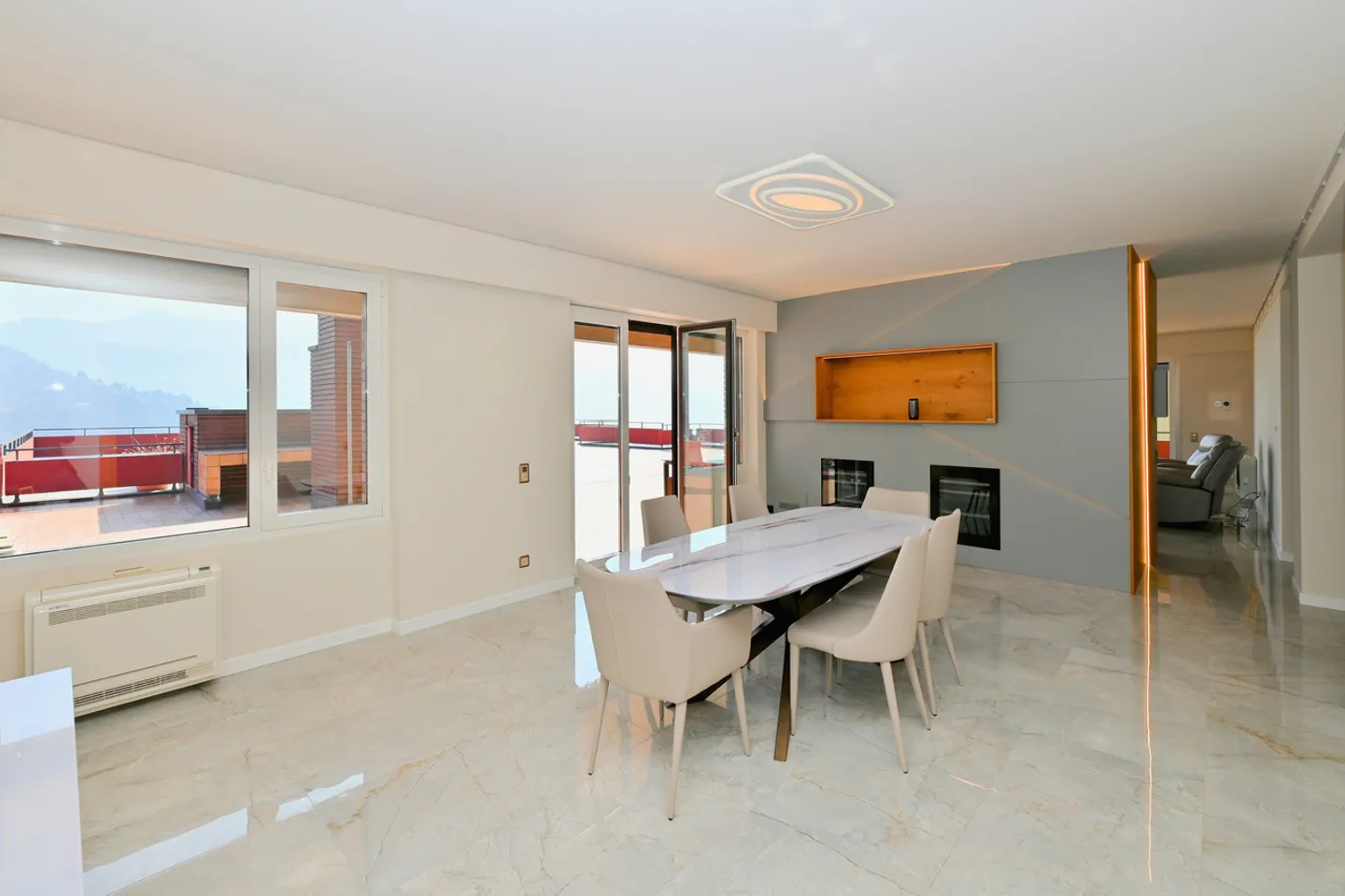 Exclusive Penthouse with 180° Panoramic Terrace over Lake and Mountains - Photo 5 of 26
