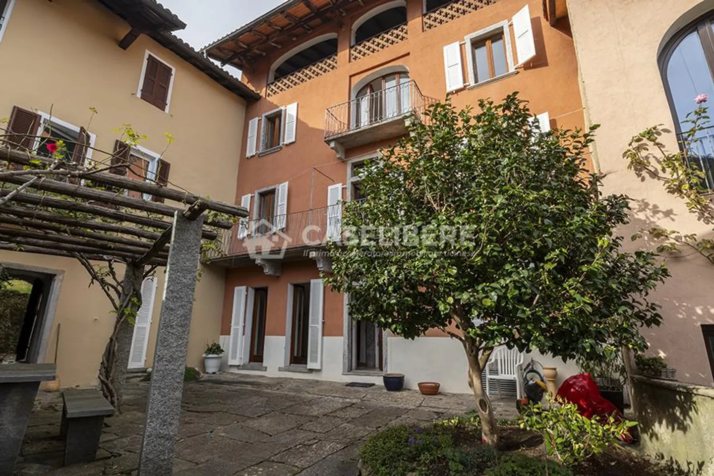 HOUSE IN COURTYARD OF 5.5 ROOMS IN PURA + RUSTIC - Photo 1 of 24