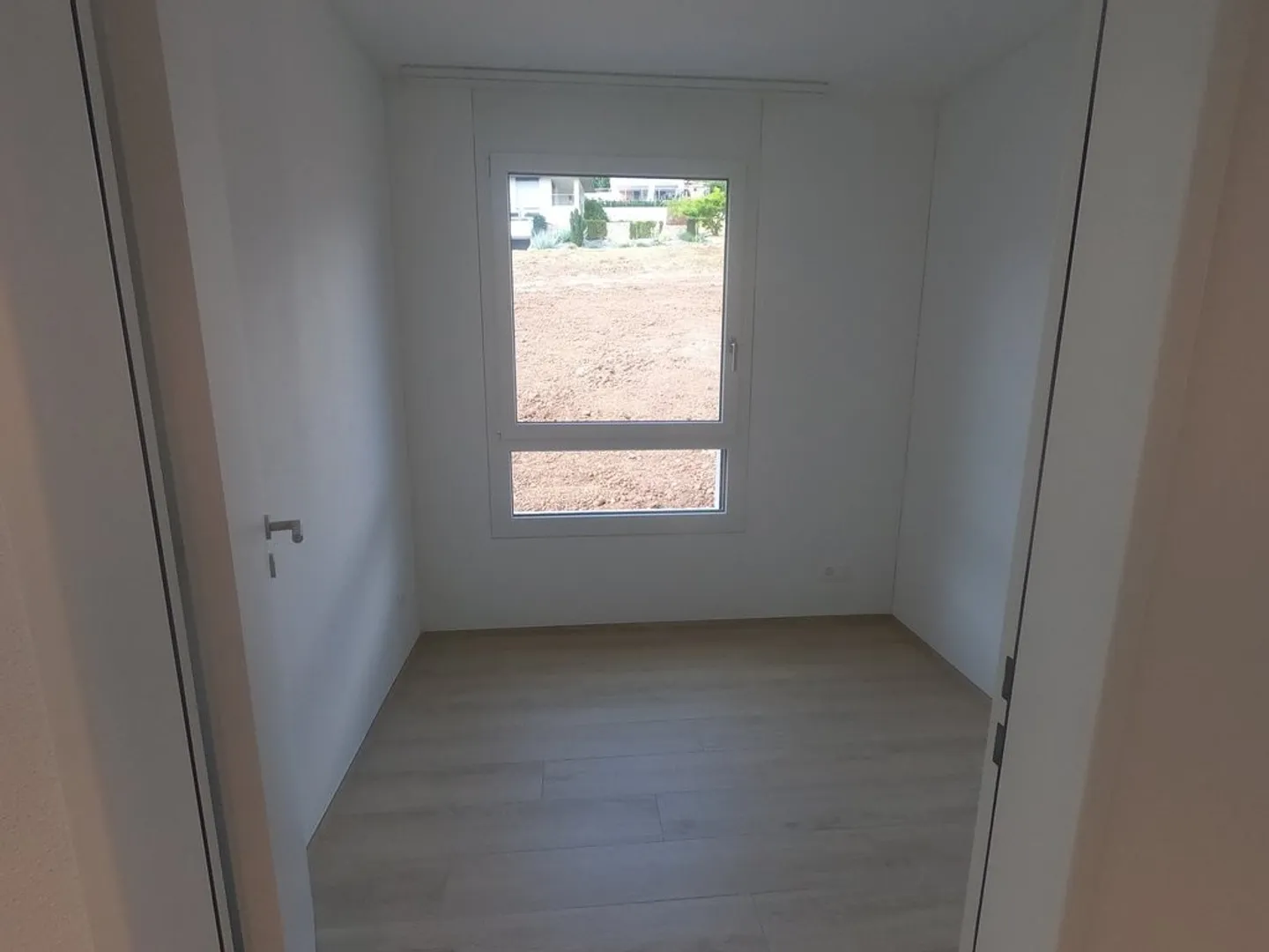 Moderno appartamento di 3.5 locali con vista sulla campagna - Foto 4 di 7