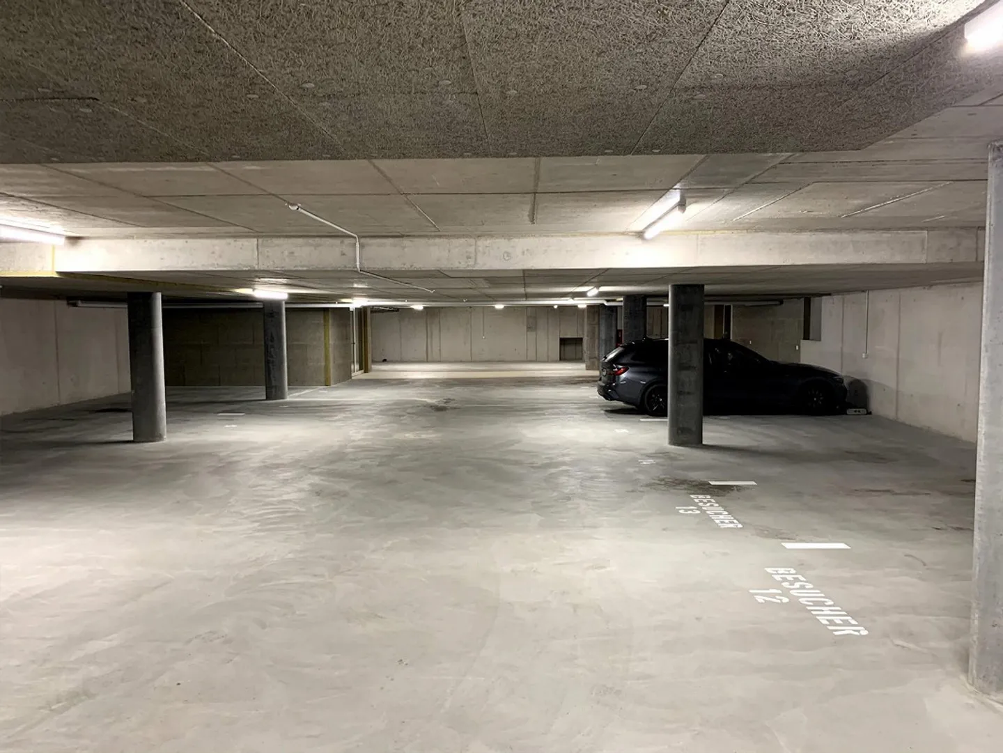 Einstellhallenparkplatz in Binningen - Foto 2 von 2