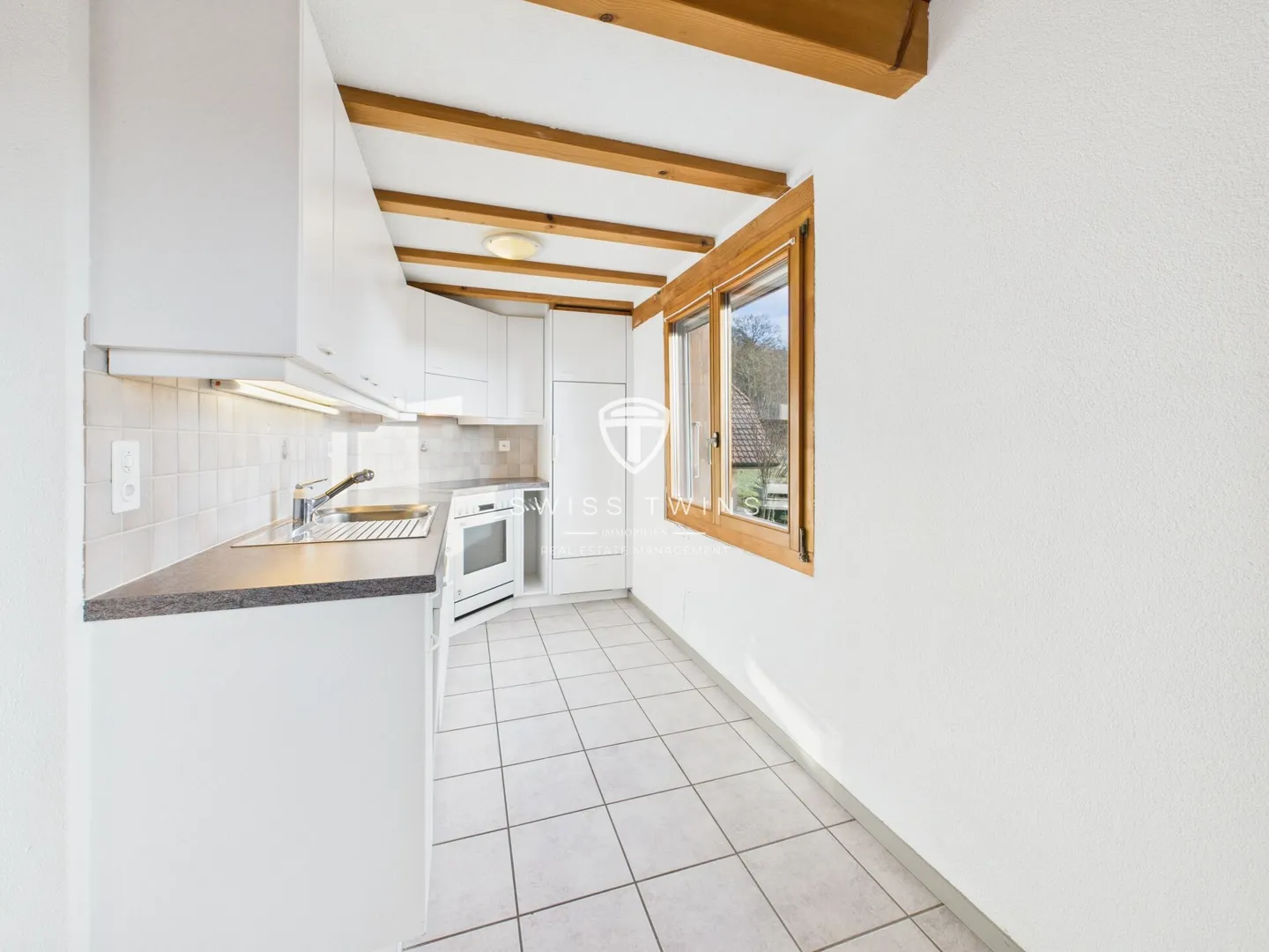 Charming 2.5-room maisonette apartment in a quiet, green environment - Photo 3 of 11