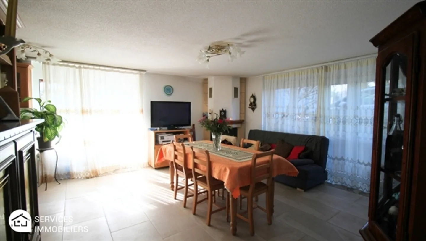 Appartement confortable au niveau du jardin - Photo 6 sur 18