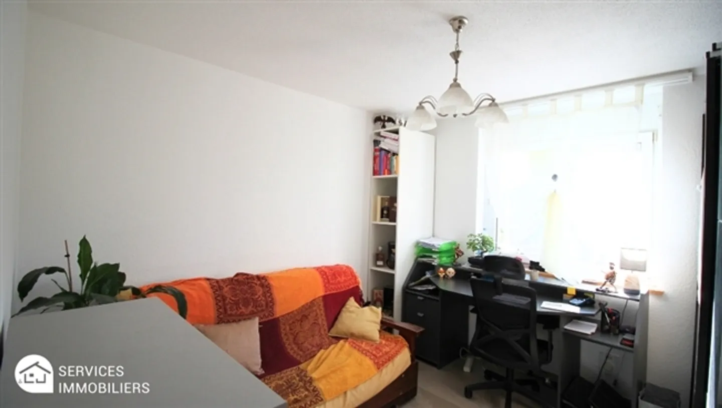 Appartement confortable au niveau du jardin - Photo 12 sur 18