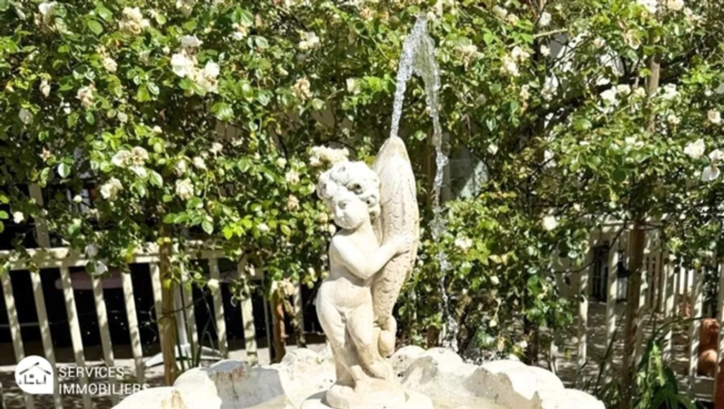 Appartement confortable au niveau du jardin - Photo 18 sur 18