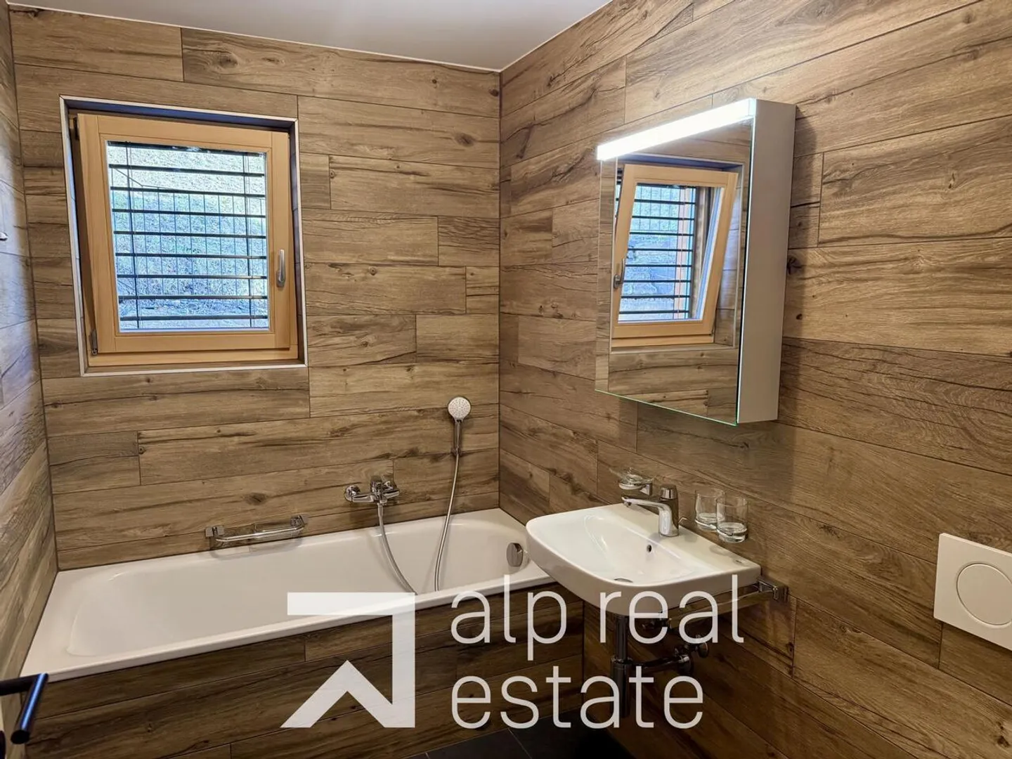 Appartamento nuovo di 2,5 stanze con terrazza a sud e vista sulle montagne - Foto 6 di 15