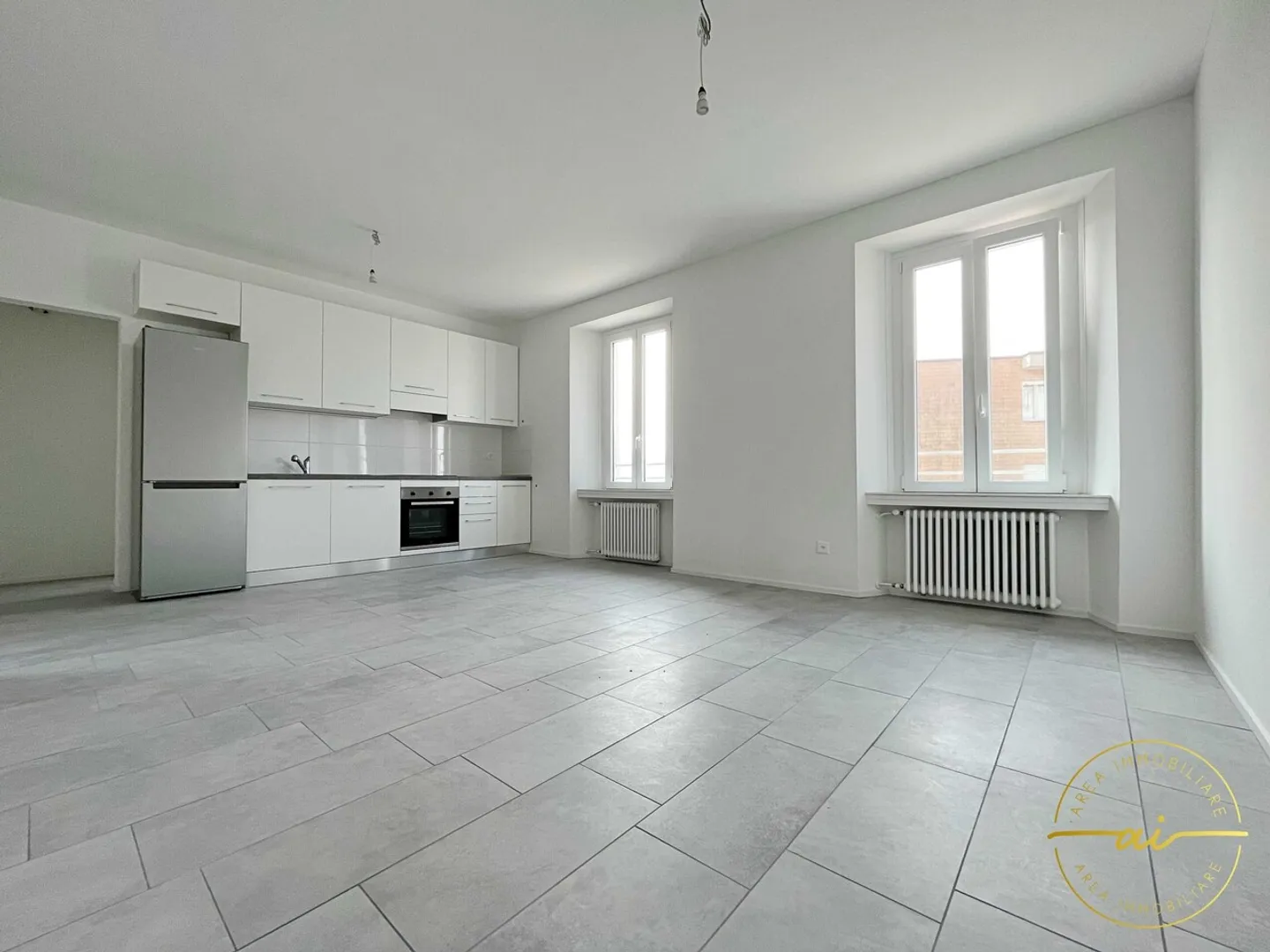 MODERNO APPARTAMENTO 2.5 LOCALI A MORBIO INFERIORE - Foto 1 di 5