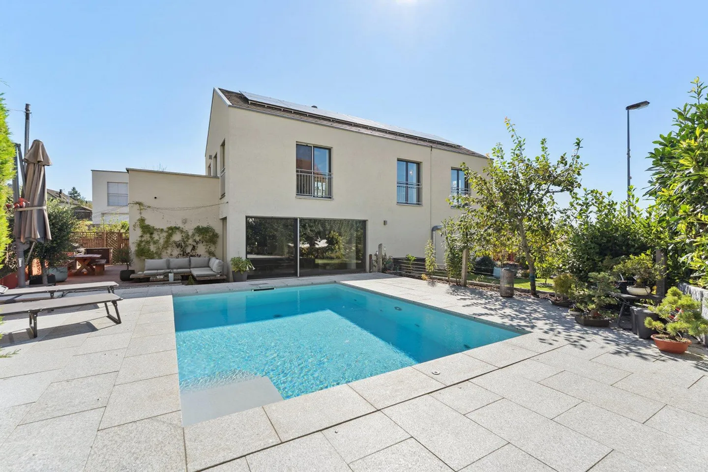 Stylish home with smart home, large garden and outdoor pool - Photo 1 of 4