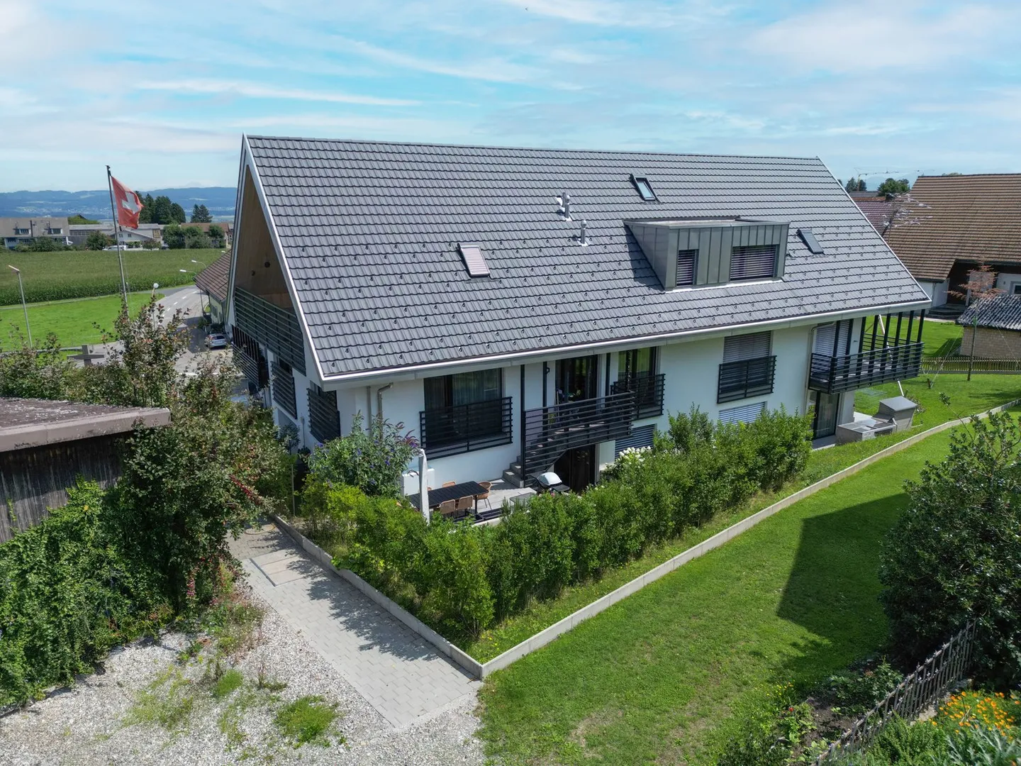 Stilvolle Maisonettewohnung mit Gartenanteil und hochwertiger Ausstattung - Foto 1 von 16