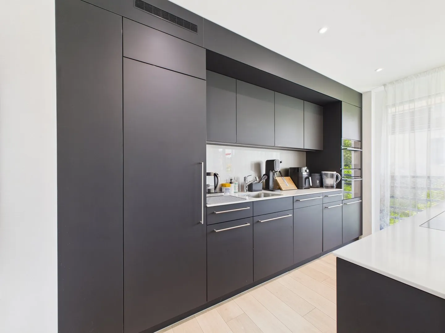 Stilvolle Maisonettewohnung mit Gartenanteil und hochwertiger Ausstattung - Foto 7 von 16