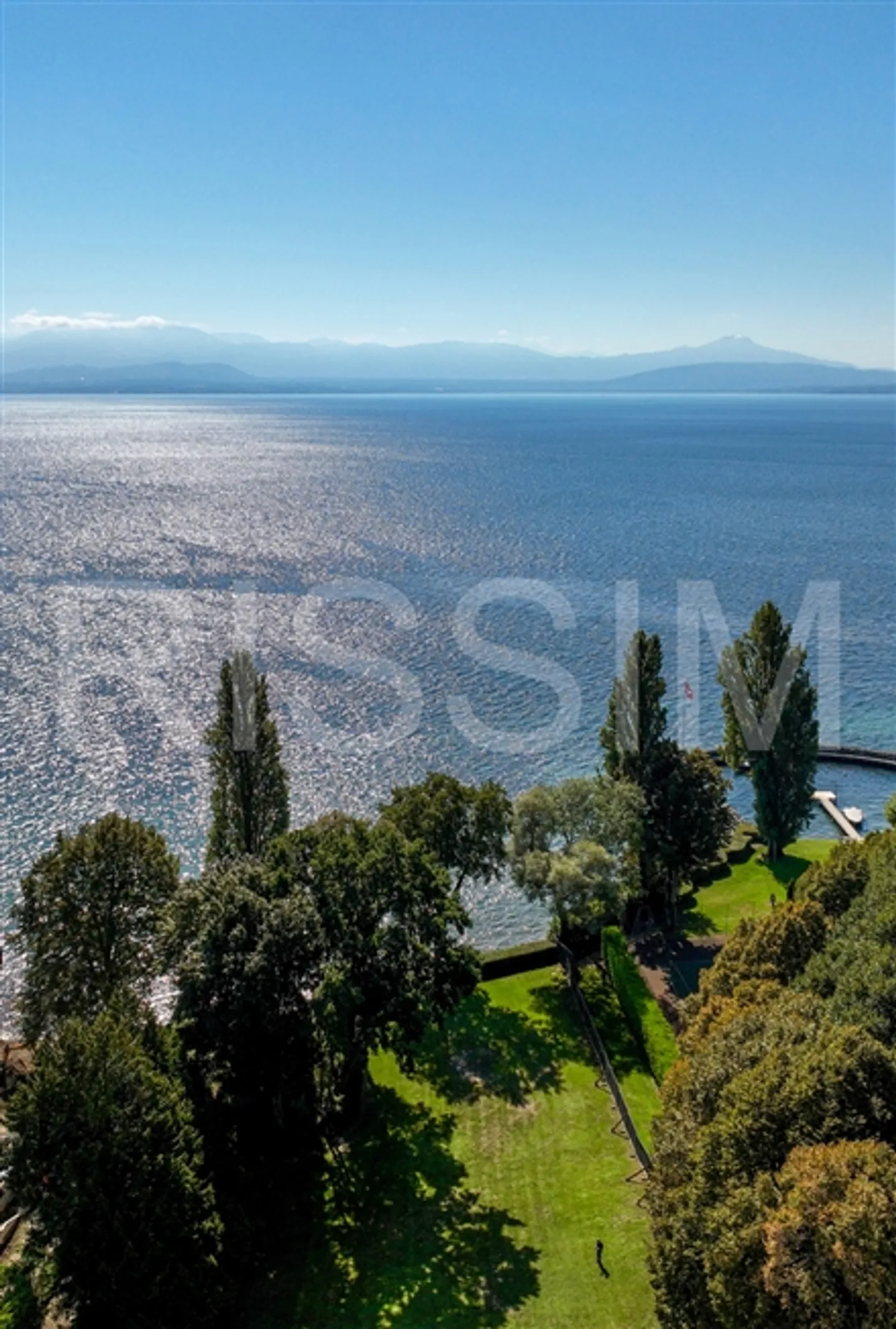 Magnifico terreno fronte lago con progetto di costruzione - Foto 7 di 19