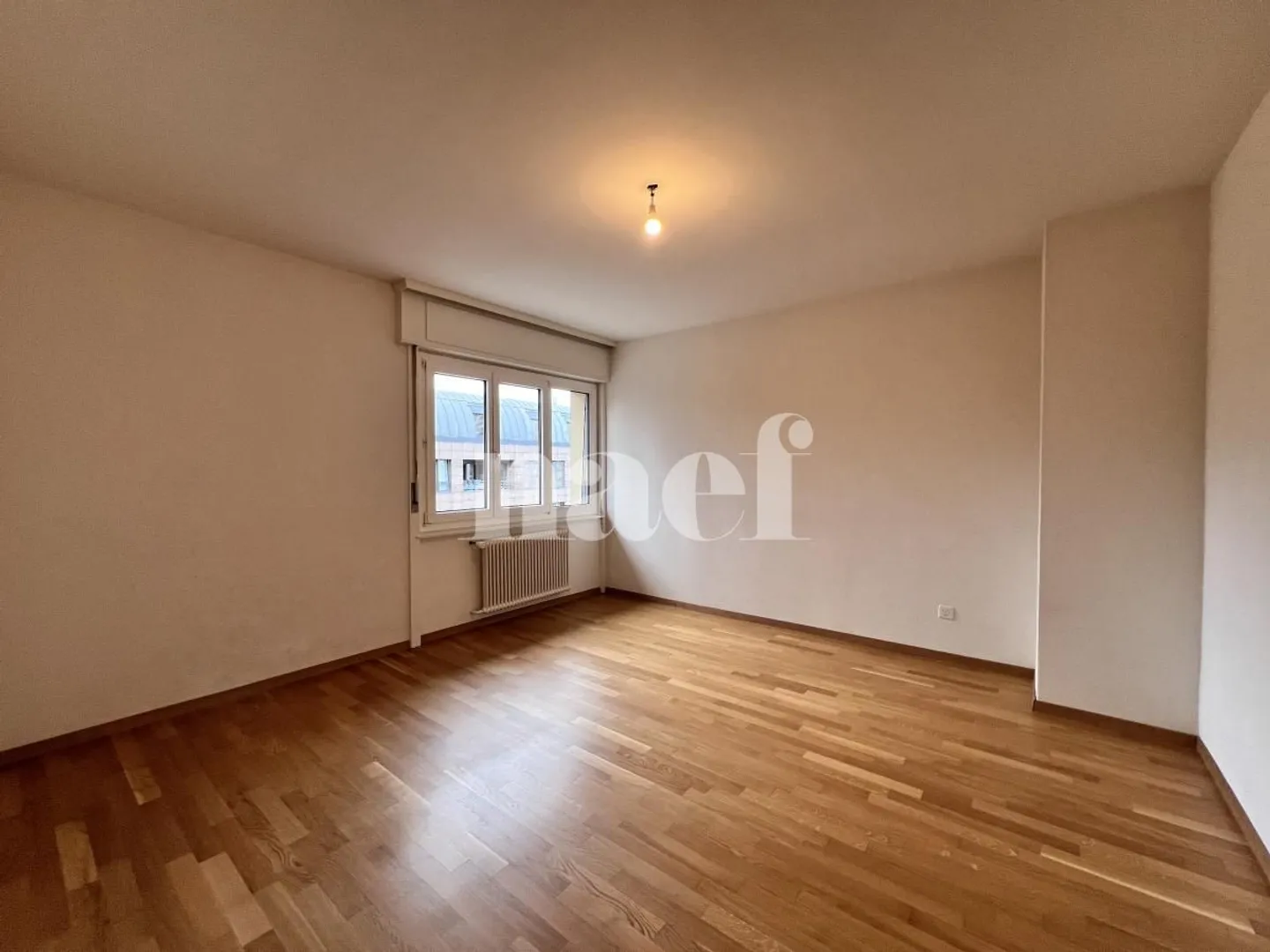 3,5-Zimmer-Wohnung im 5. Stock in Fribourg! - Foto 3 von 9
