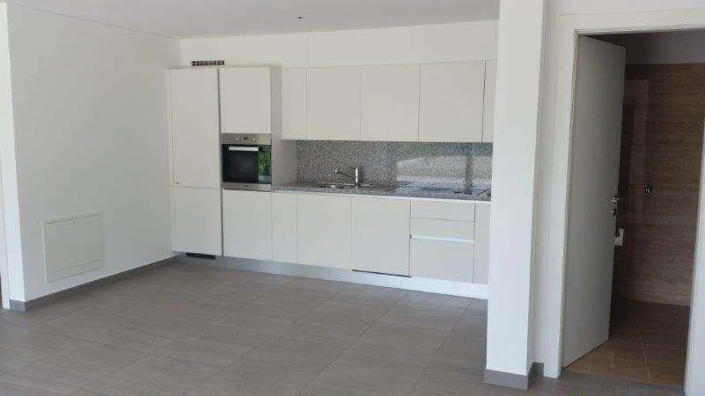 Wohnung 3.5 Zimmer mit Terrasse und Garten - Foto 4 von 8