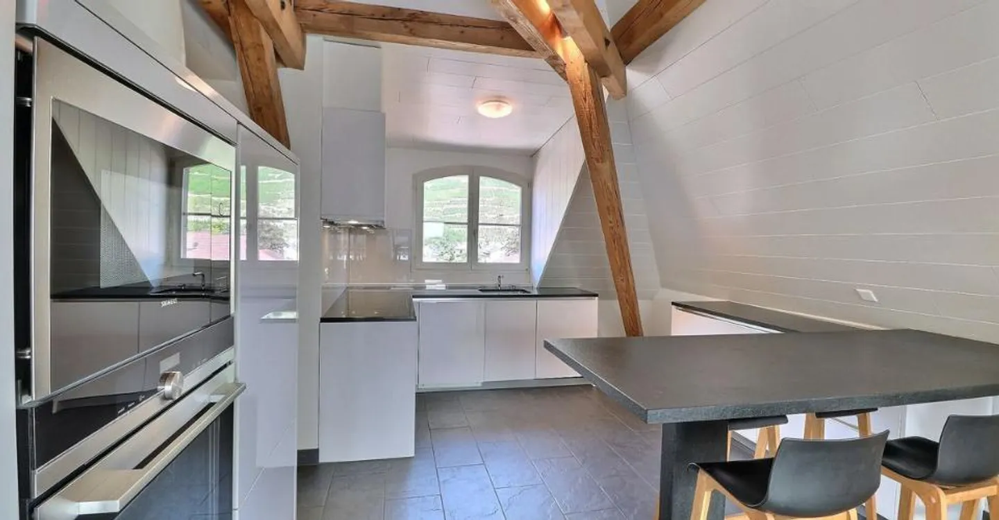 DUPLEX MIT EINZIGARTIGEM CHARAKTER IM ZENTRUM VON AIGLE - Foto 5 von 11