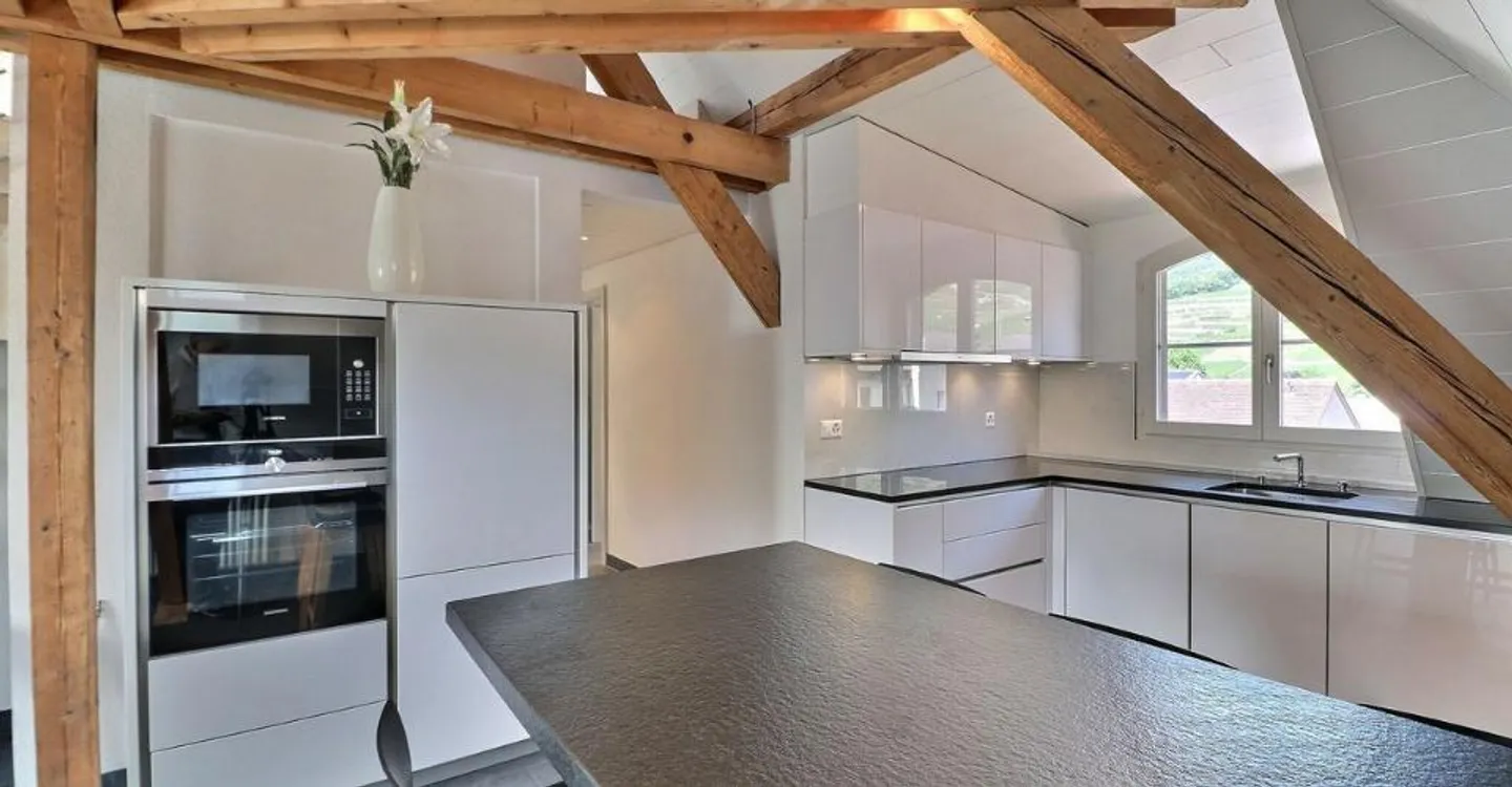 DUPLEX MIT EINZIGARTIGEM CHARAKTER IM ZENTRUM VON AIGLE - Foto 6 von 11